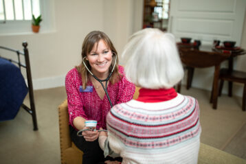 Nurse with a Cordia assisted living member